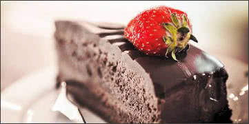 Slice of Dark Chocolate Cake with Strawberry
